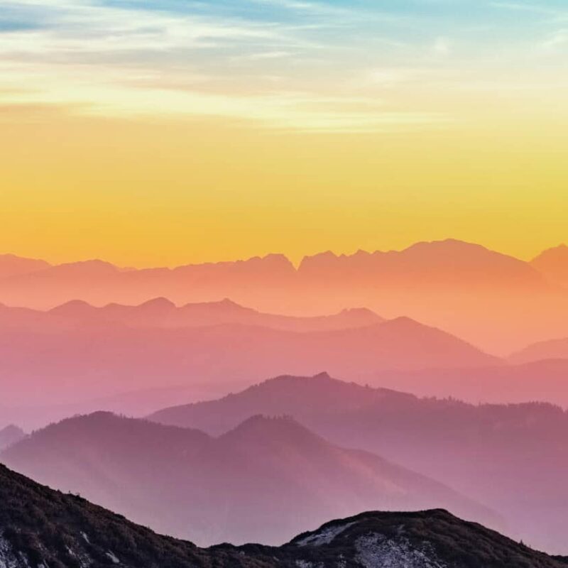 Mountain view with multiple colorsâ€”blue, yellow-pinkâ€”to show life after depression with Spravato.